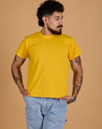 Jesse is 5’8” and wearing S Organic Vintage Tee in Sunshine Yellow