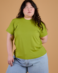 Ashley is 5’7” and wearing L Organic Vintage Tee in Gross Green