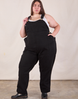 Marielena is 5'8" and wearing 2XL Original Overalls in Mono Black