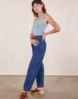 Angled front view of Cropped Tank Top in Periwinkle and dark wash Denim Trouser Jeans on Alex