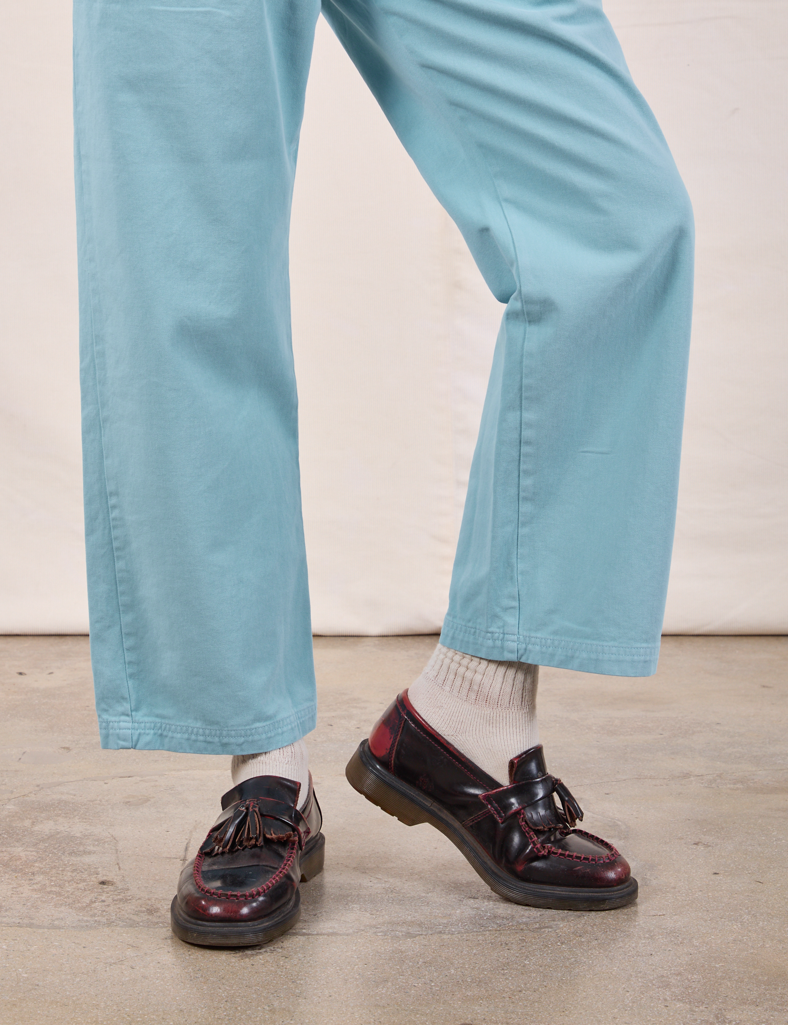 Work Pants in Baby Blue pant leg close up on Quinn