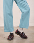 Work Pants in Baby Blue pant leg close up on Quinn