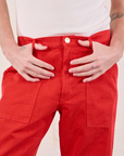 Work Pants in Mustang Red front close up on Quinn