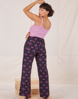 Back view of Western Pants in Purple Tile Jacquard and bubblegum pink Cami on Tiara