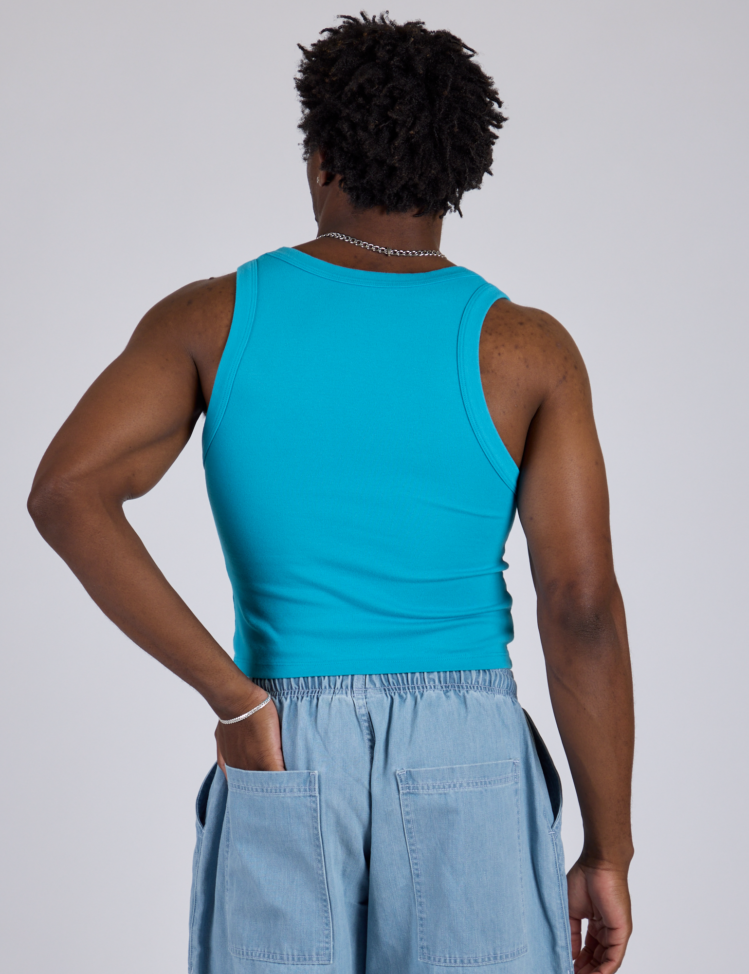 Cropped Tank Top in Hawaiian Blue back view on Isaac