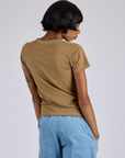 Back view of Jr. Varsity Tee in Desert Brown on Kira