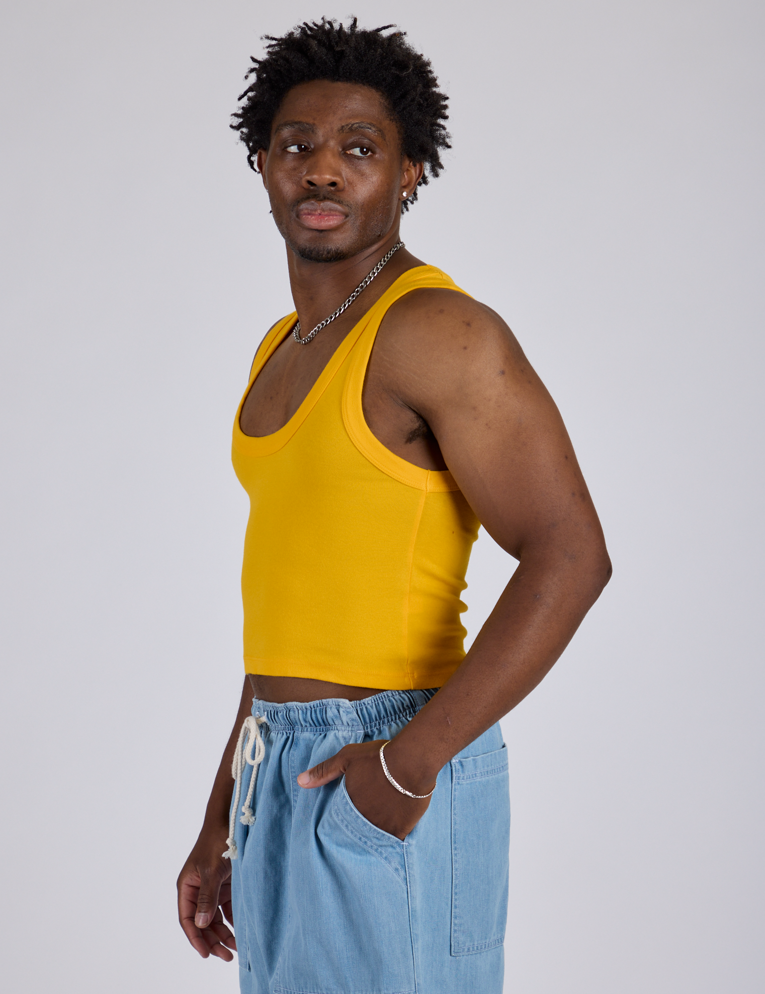 Cropped Tank Top in Sunshine Yellow side view on Isaac