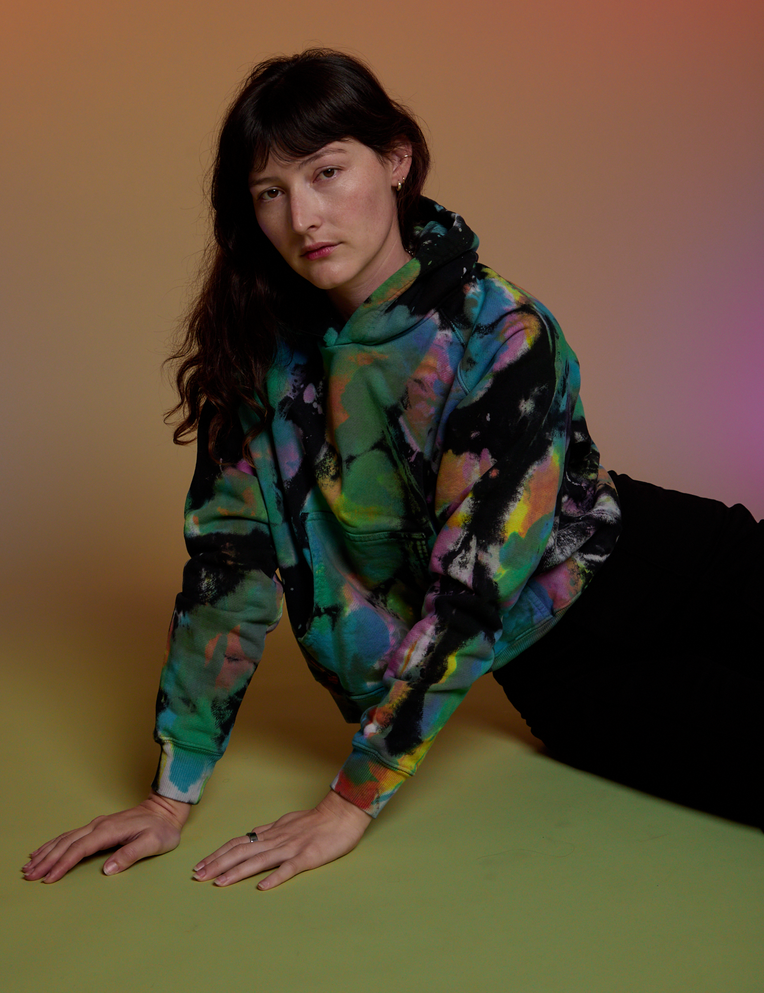 Oversized Hoodie in Rainbow Magic Waters worn on Alex