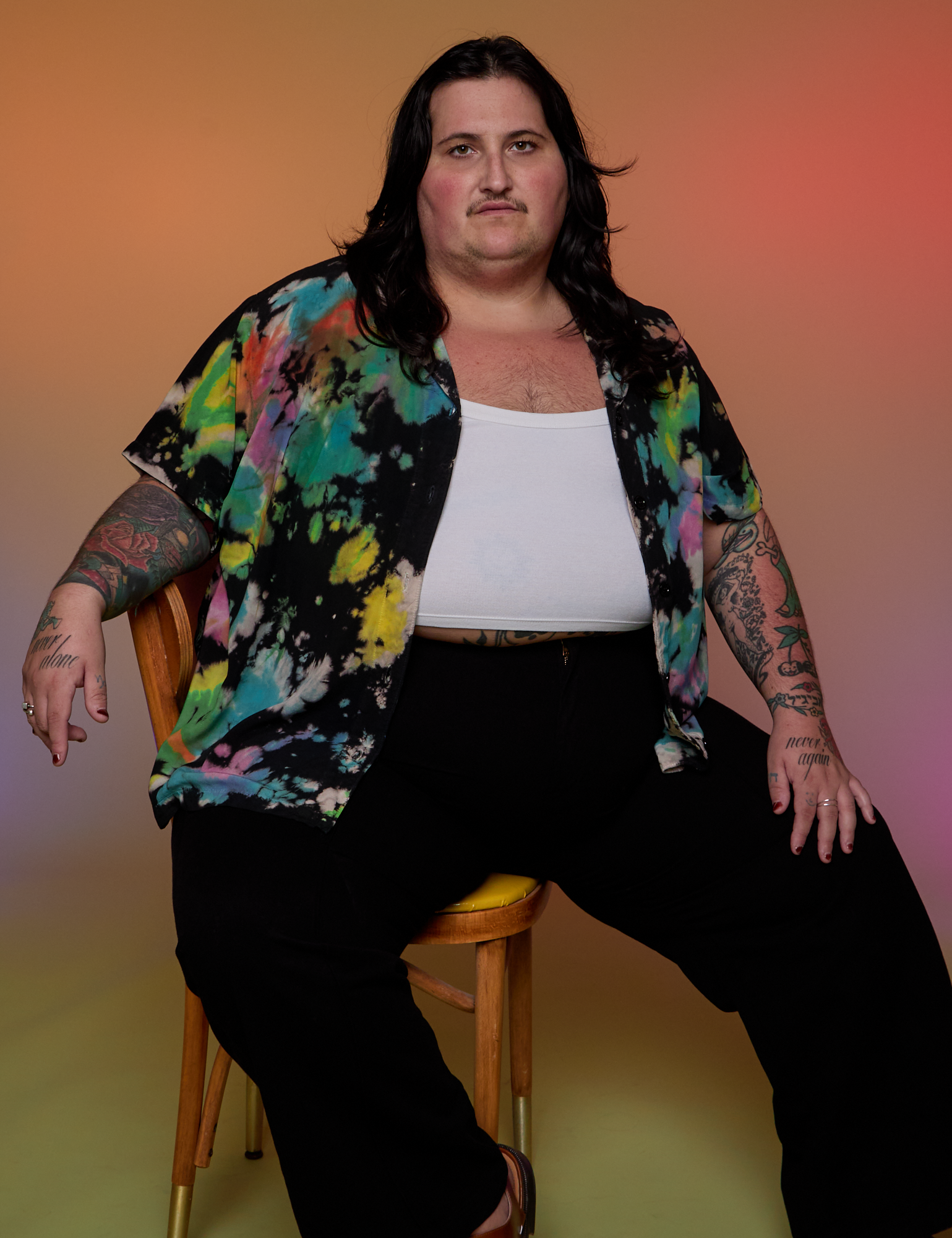 Pantry Button-Up in Rainbow Magic Waters and black Western Pants on Sam