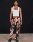 Jerrod is 6'3" and wearing M Rainbow Magic Waters Work Pants paired with a vintage tee off-white Cropped Tank