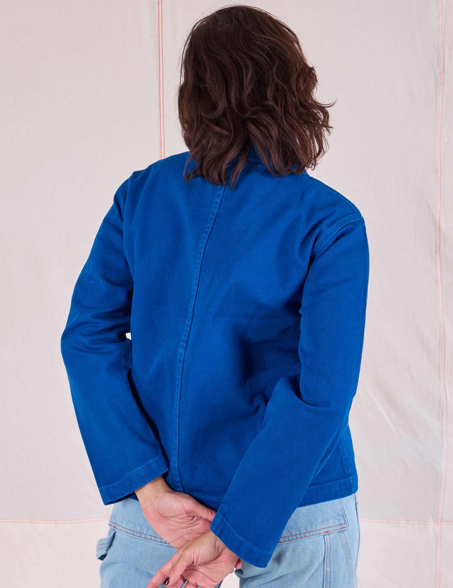 Denim Work Jacket in Royal Blue back view on Tiara