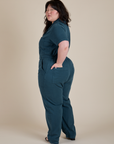Angled back view of Short Sleeve Jumpsuit in Lagoon on Ashley