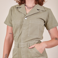 Front close up of Short Sleeve Jumpsuit in Khaki Grey worn by Alex