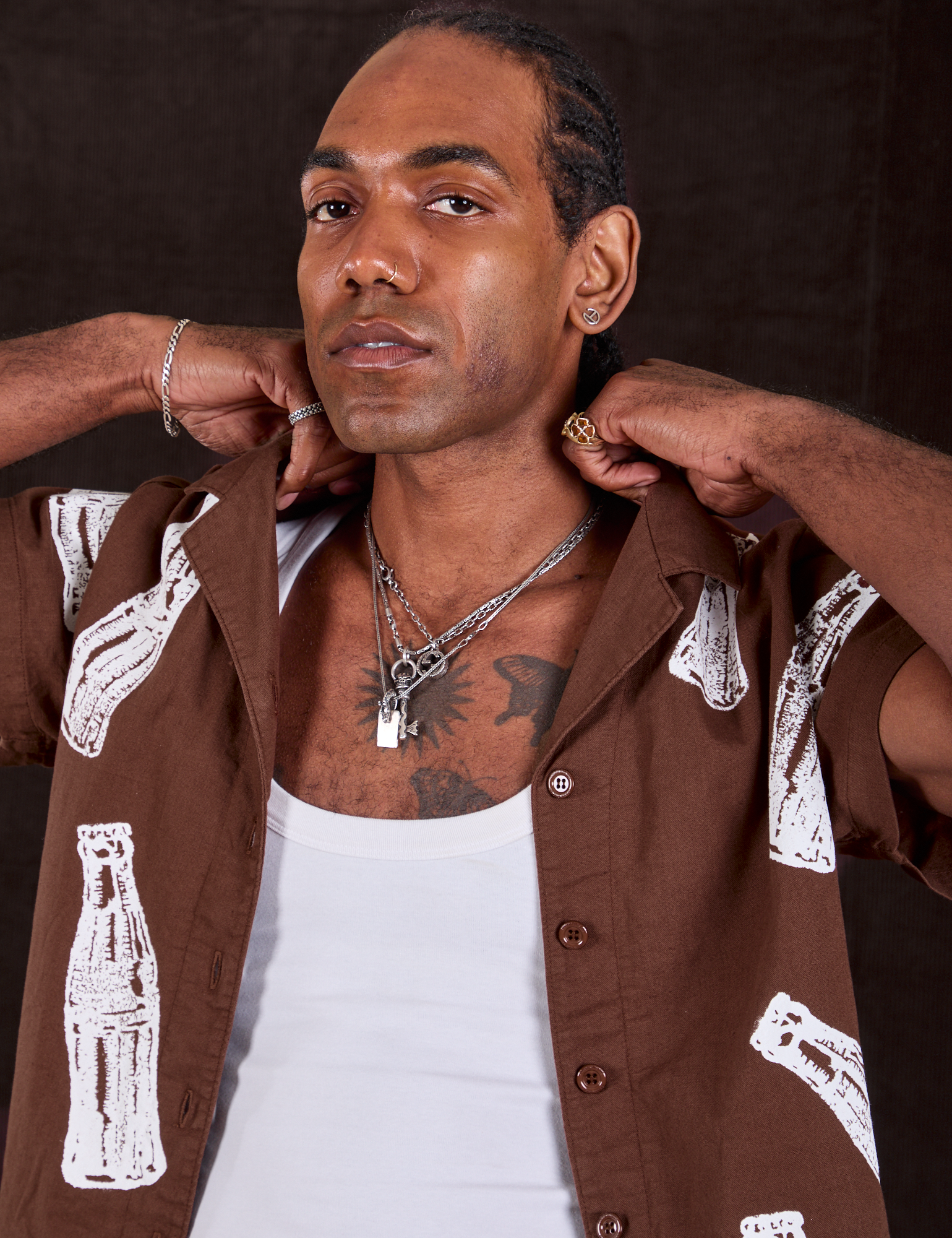 Soda Bottle Pantry Button-Up in Fudgesicle Brown close up on Jerrod