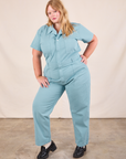 Juliet is 5'7" and wearing 1XL Short Sleeve Jumpsuit in Baby Blue