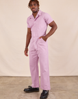 Issac is wearing Short Sleeve Jumpsuit in Lilac