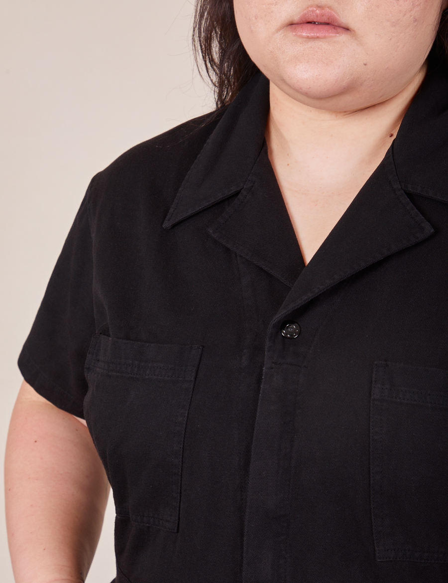 Front close up of Short Sleeve Jumpsuit in Basic Black worn by Ashley