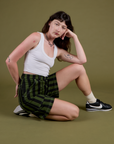 Longline Work Shorts in Evergreen and vintage tee white Cropped Tank on Alex