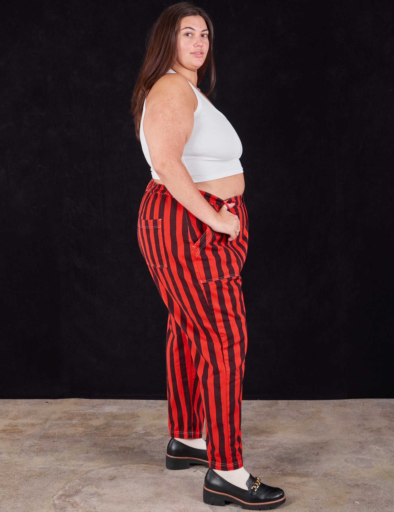 Black Stripe Work Pants in Mustang Red side view on Katie