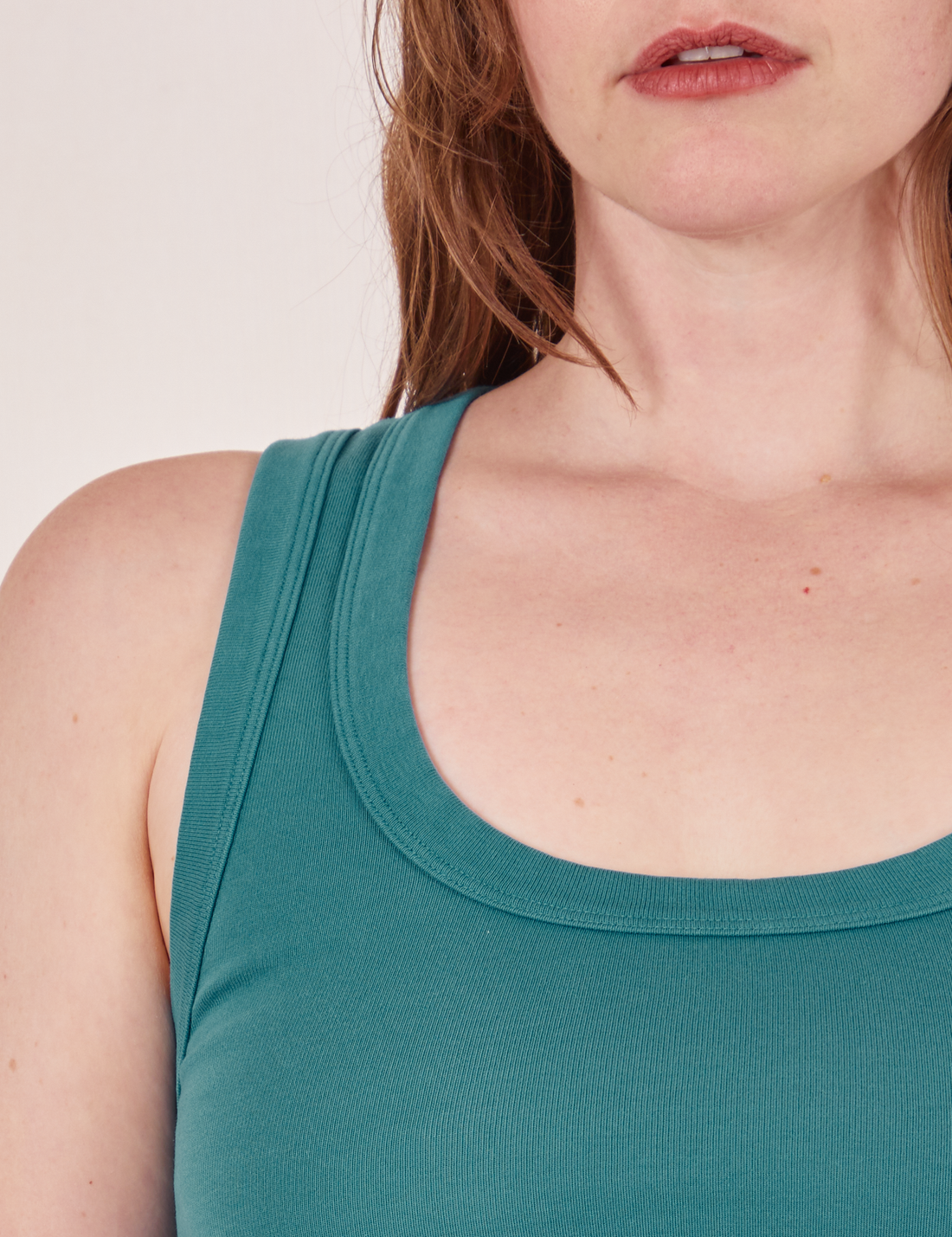Upper front shoulder close up of Tank Top in Marine Blue worn by Allison