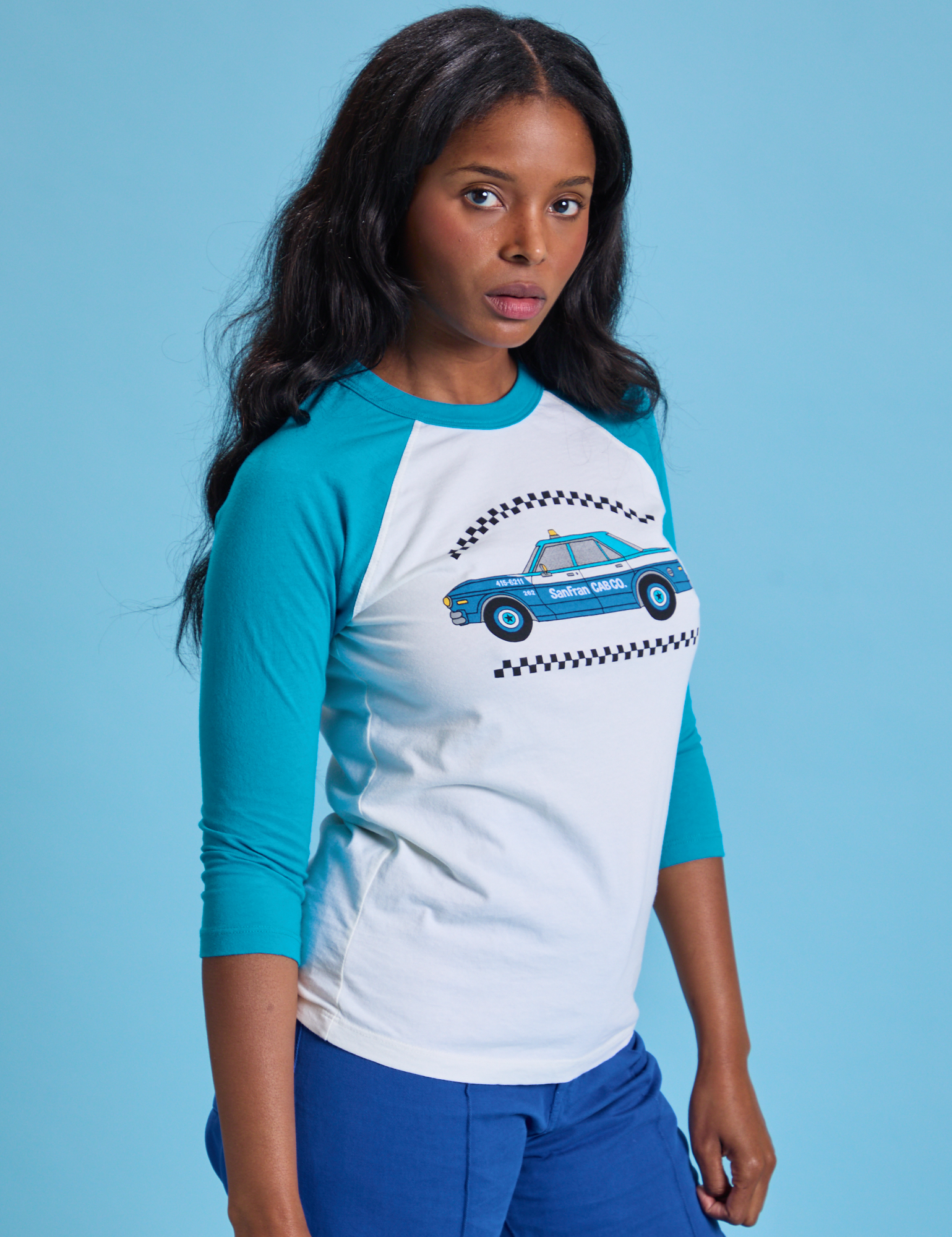 Taxi Raglan Tee in San Francisco angled front view on Kandia