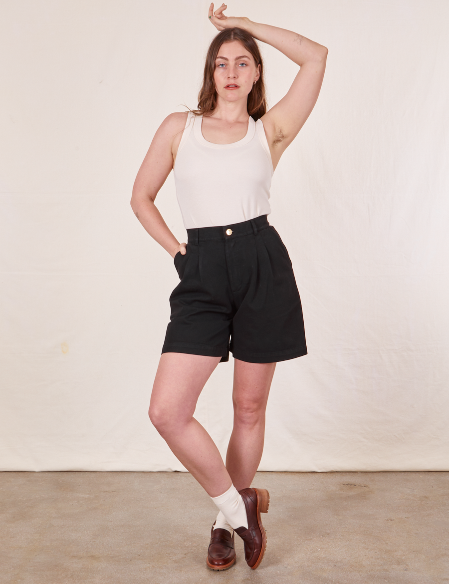 Allison is 5'10" and wearing XS Trouser Shorts in Basic Black paired with a vintage off-white Tank Top