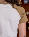 Short Sleeve Raglan Tee in Garlic back shoulder close up on Alex