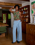 Kitchen Collection Racerback Tank and light wash Indigo Denim Wide Leg Trousers on Jerrod