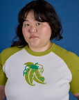 Front close up of Produce Raglan Tee in Snap Peas on Ashley