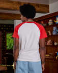 Back view of Short Sleeve Raglan Tee in Tomatoes on Jerrod