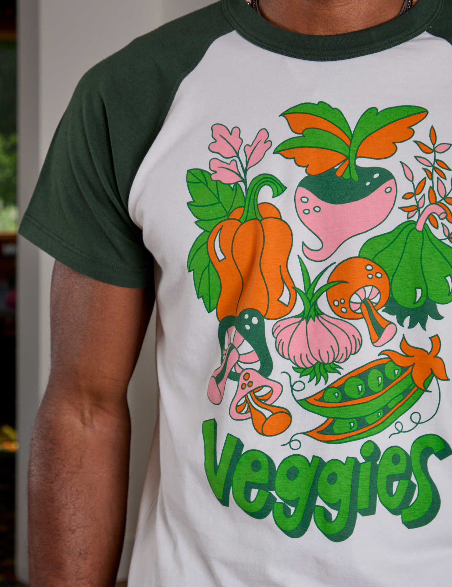 Short Sleeve Raglan Tee in Veggies front close up on Jerrod