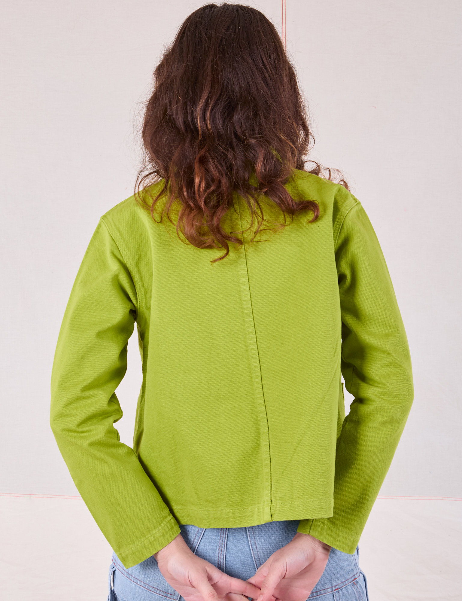 Denim Work Jacket in Gross Green back view on Alex