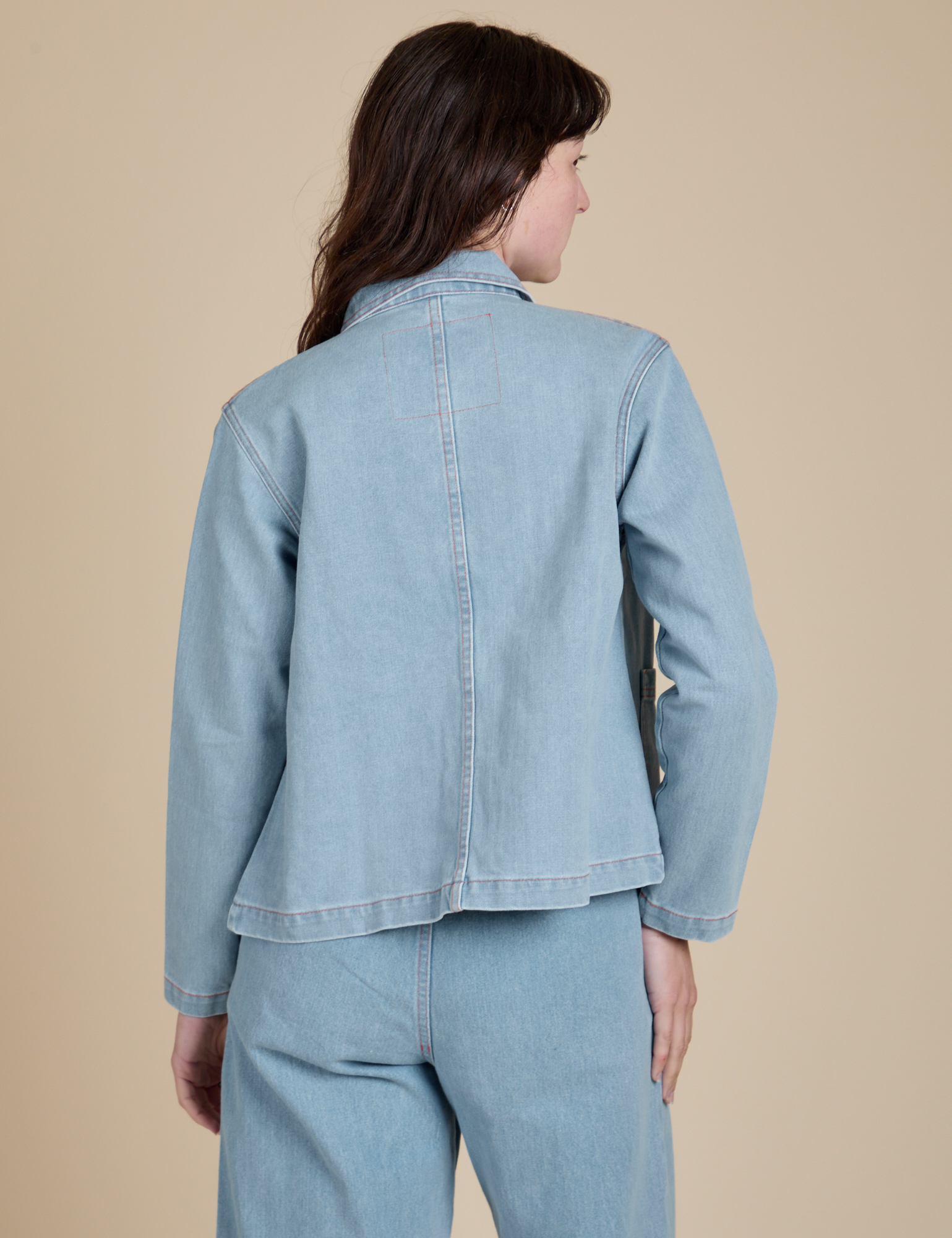 Indigo Denim Work Jacket in Light Wash back view on Alex