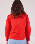 Denim Work Jacket in Mustang Red back view on Alex