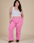Ashley is 5’7” and wearing 1XL Work Pants in Bubblegum Pink paired with Cropped Tank in Vintage Tee White