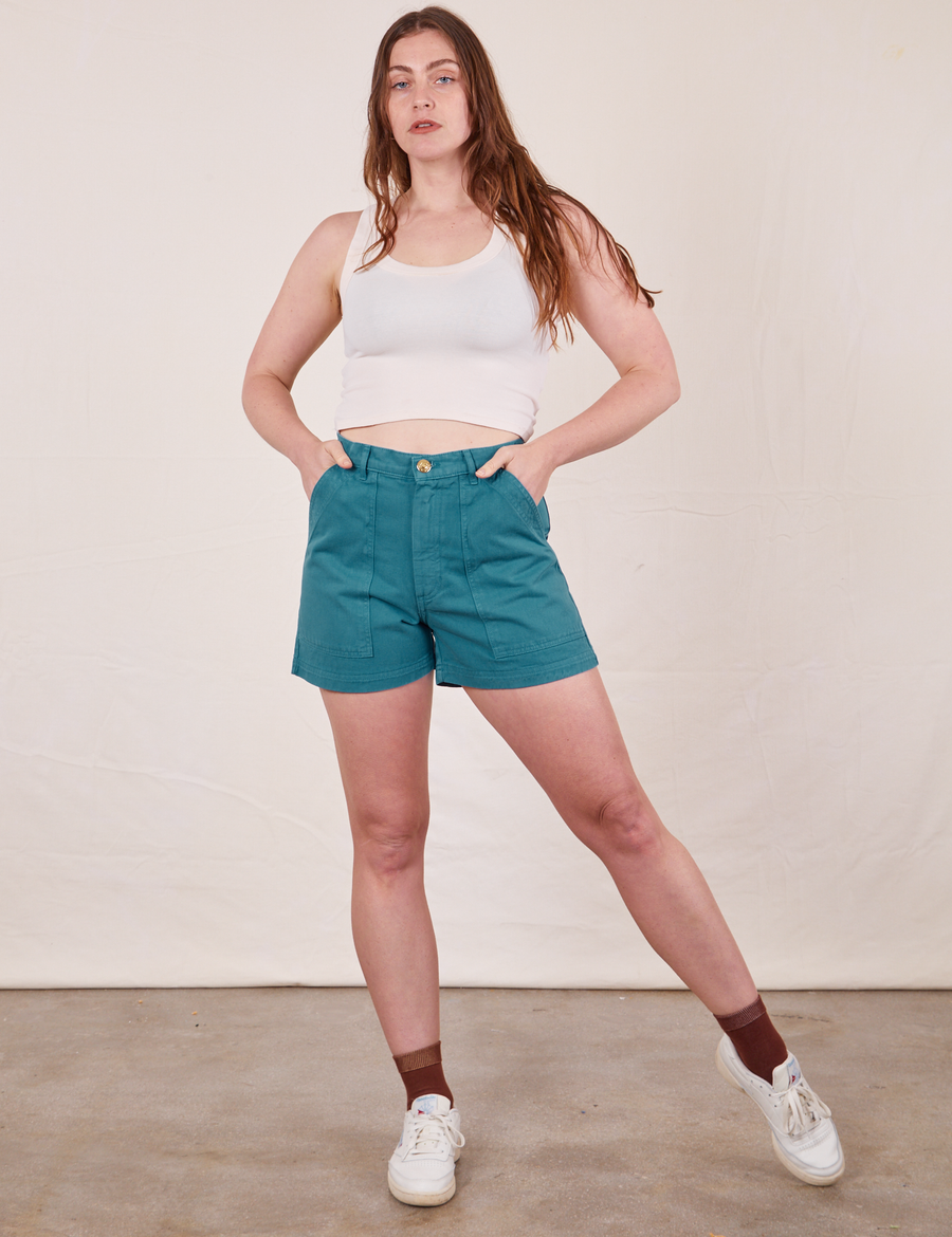 Allison is 5'10" and wearing size S Classic Work Shorts in Marine Blue paired with vintage off-white Tank Top