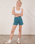 Madeline is 5’9” and wearing XXS Classic Work Shorts in Marine Blue paired with a Cropped Tank Top in vintage tee off-white