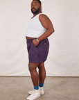 Side view of Classic Work Shorts in Nebula Purple and Tank Top in vintage tee off-white on Elijah