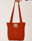 Over-Shoulder Zip Mini Tote in Paprika held by model