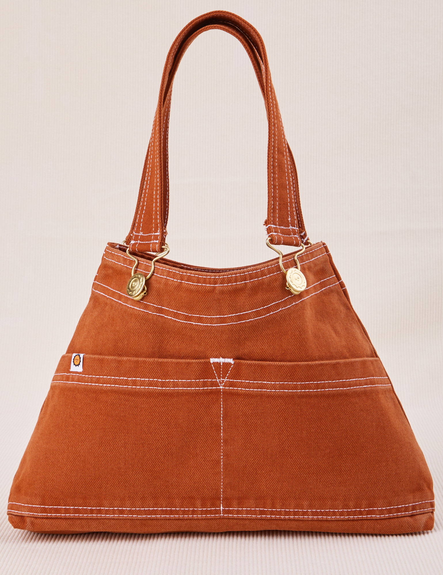 Overall Handbag in Burnt Terracotta with handle straps standing up