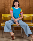 Calypso Tee in Rainbow and light wash Indigo Wide Leg Trousers on Alex