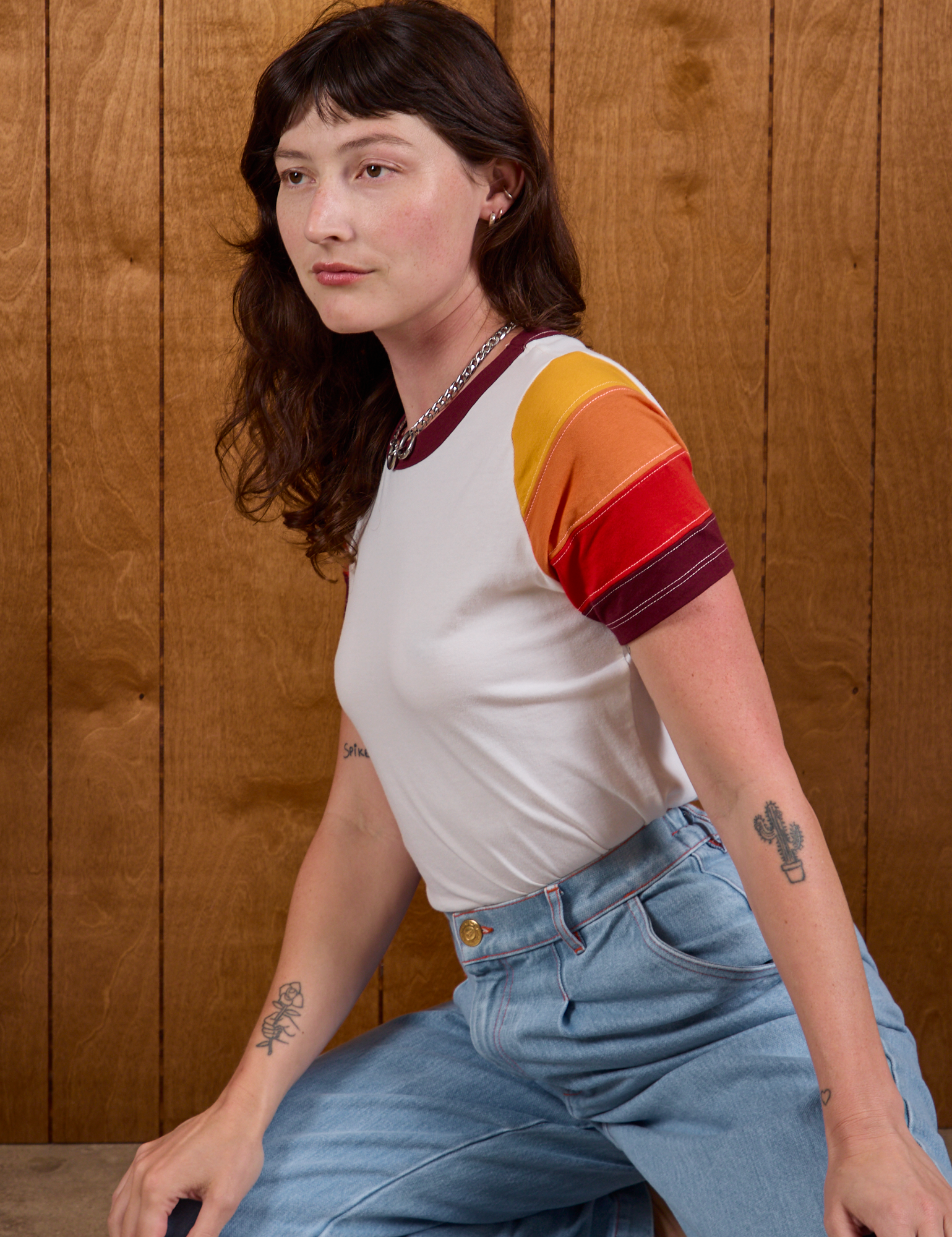 Calypso Tee in Desert worn by Alex