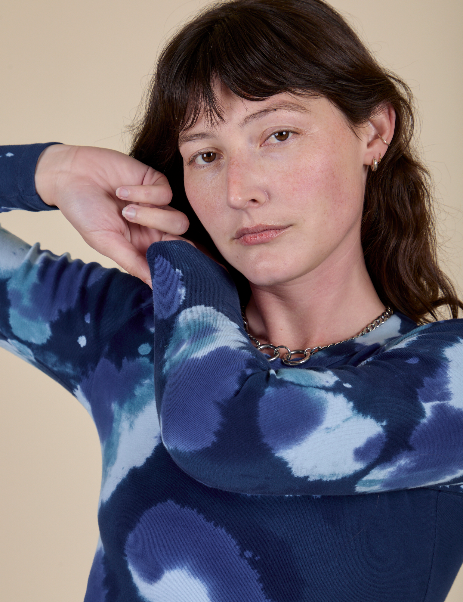 Long Sleeve Baby Tee in Blue Magic Waters front close up on Alex