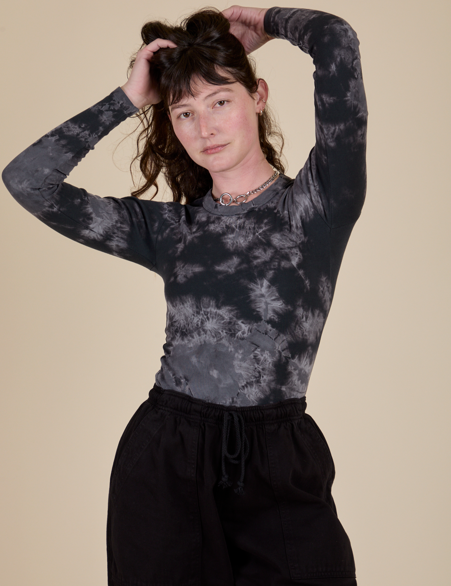 Long Sleeve Baby Tee in Black Magic Waters worn by Alex