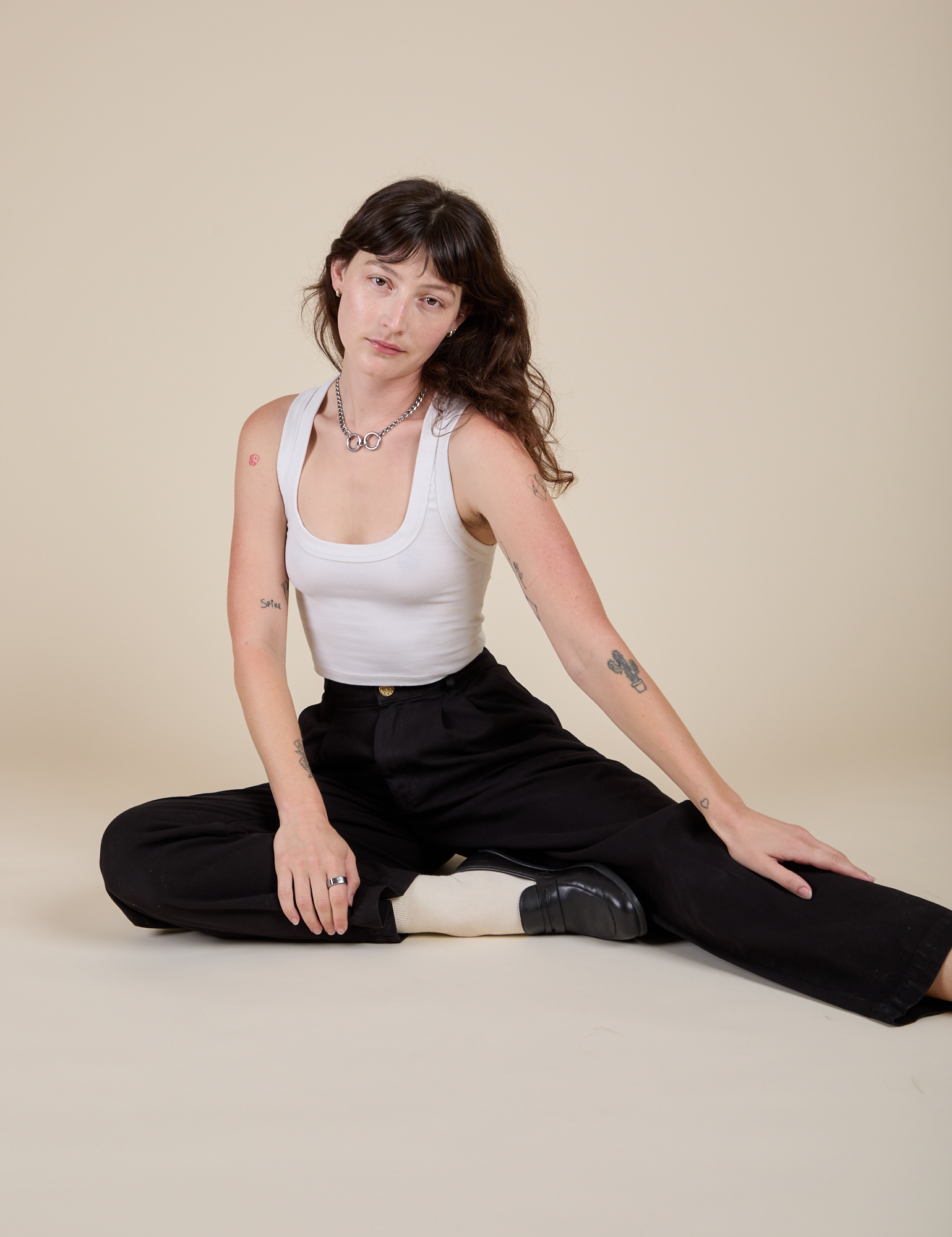 Heavyweight Trousers in Basic Black and vintage tee white Cropped Tank worn by Alex