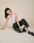 Alex is wearing Heavyweight Trousers in Swamp Green and Cropped Tank in Vintage Tee White