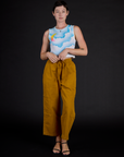 Alex wearing the Morning Moon Airbrush Muscle Tee with Spicy Mustard Drop Pocket Cargo Pants