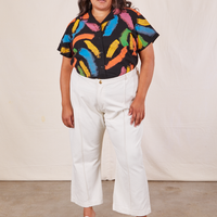Alicia is wearing Pantry Button Up in Paint Stroke tucked into vintage off-white Western Pants.