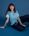 Painted Burly Tee in Baby Blue worn by Sydney