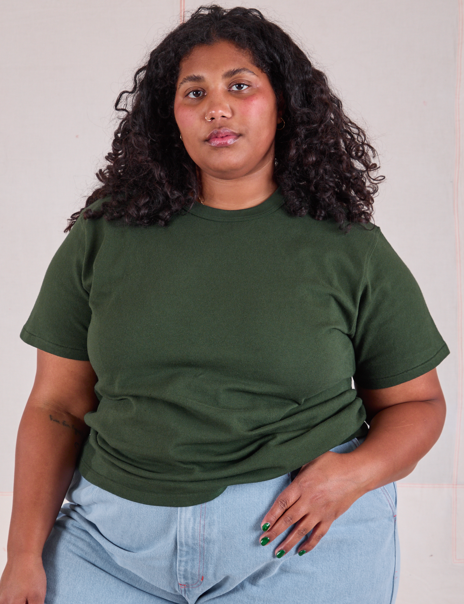 Morgan is 5&#39;5&quot; and wearing XL Burly Tee in Swamp Green